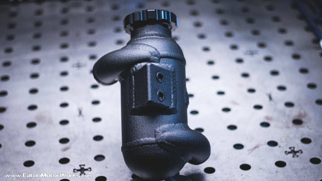 Remote mounted swirl pot